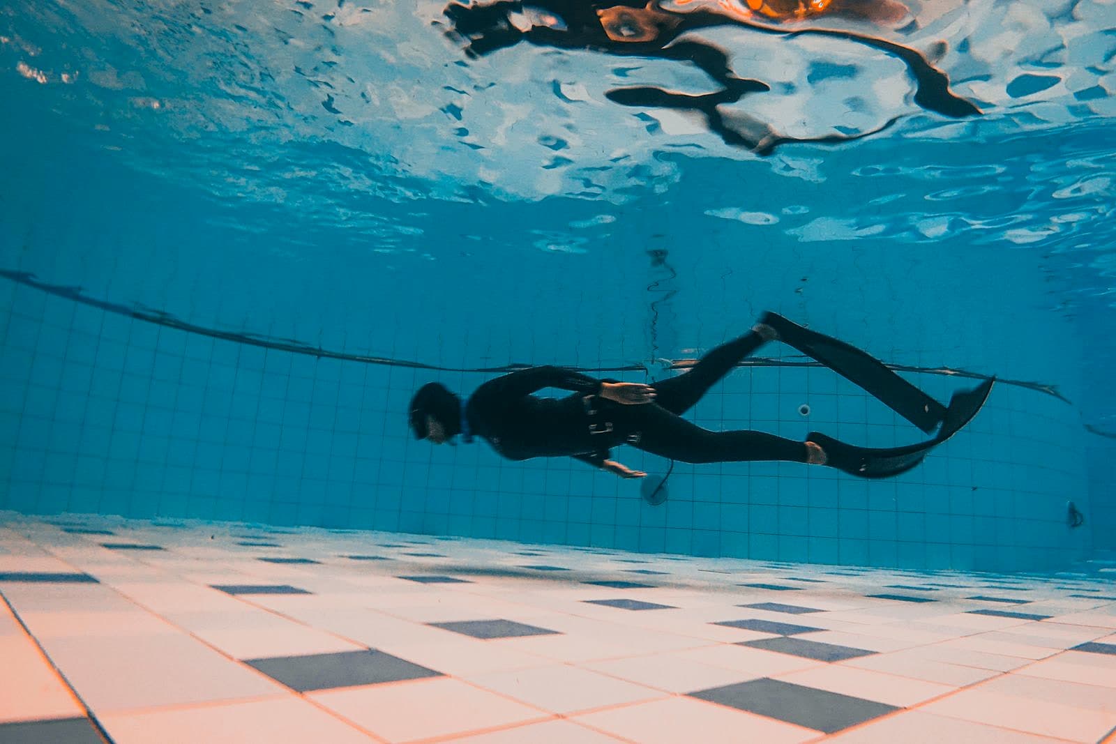 A diver training in a pool