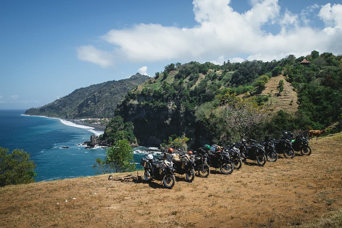 Motorcycles parked on a coastal cliff overlook, Sumbawa
